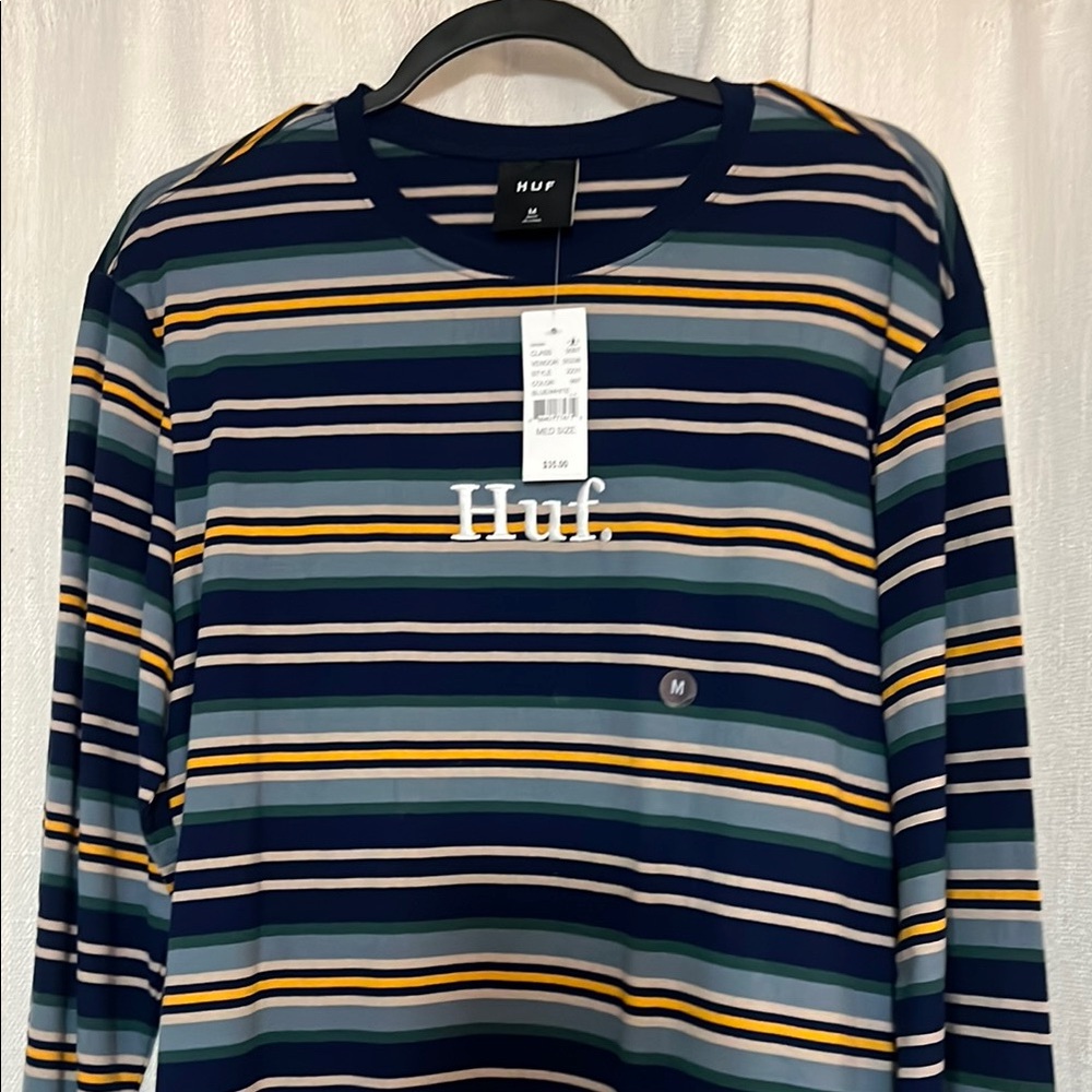 2 HUF Blue and Yellow Long Sleeve Tee 
And Dark green shirt